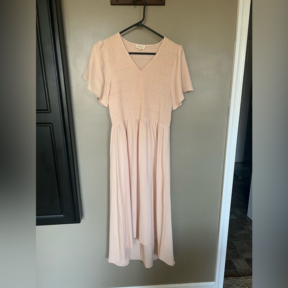 Roolee peach midi dress with tulip sleeve detail.